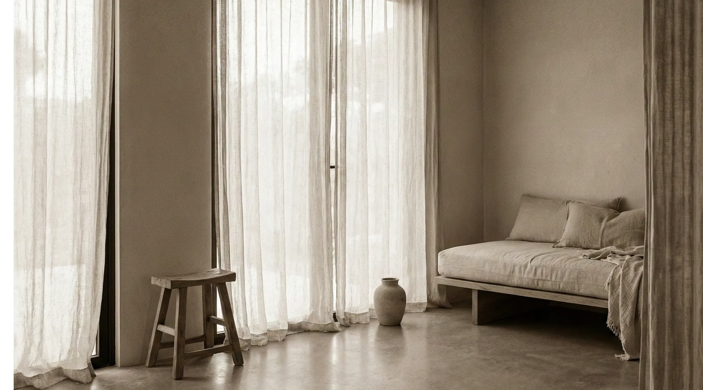 Premium interior with sheer curtains and daybed